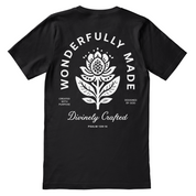 Black t-shirt with white floral design and text on a white background