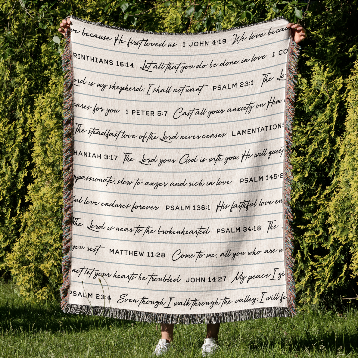 wrapped-in-his-love-and-comfort-woven-blanket-held.png